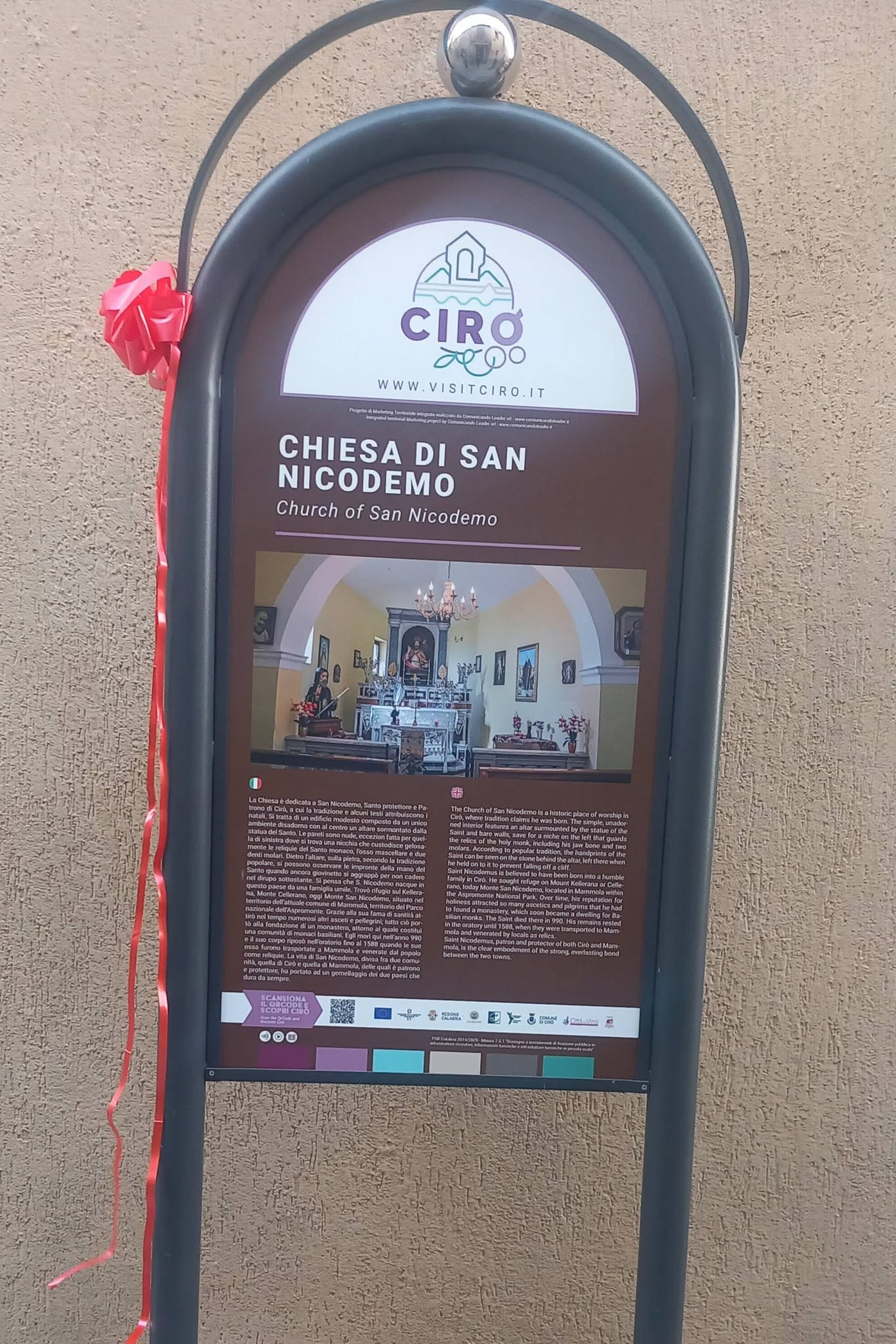 Information panel for the Church of San Nicodemo Abate in Cirò.